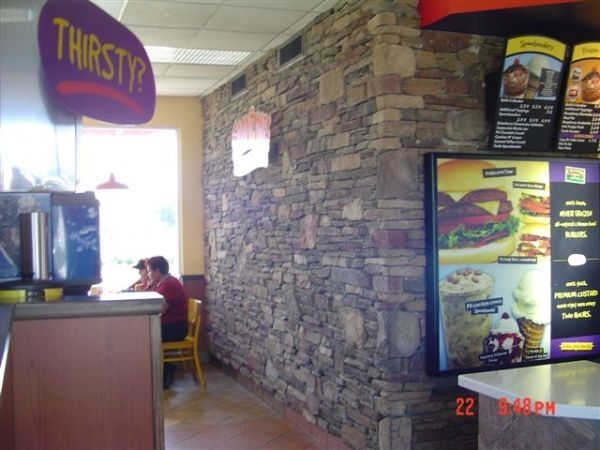 A restaurant with a sign that says thirsty