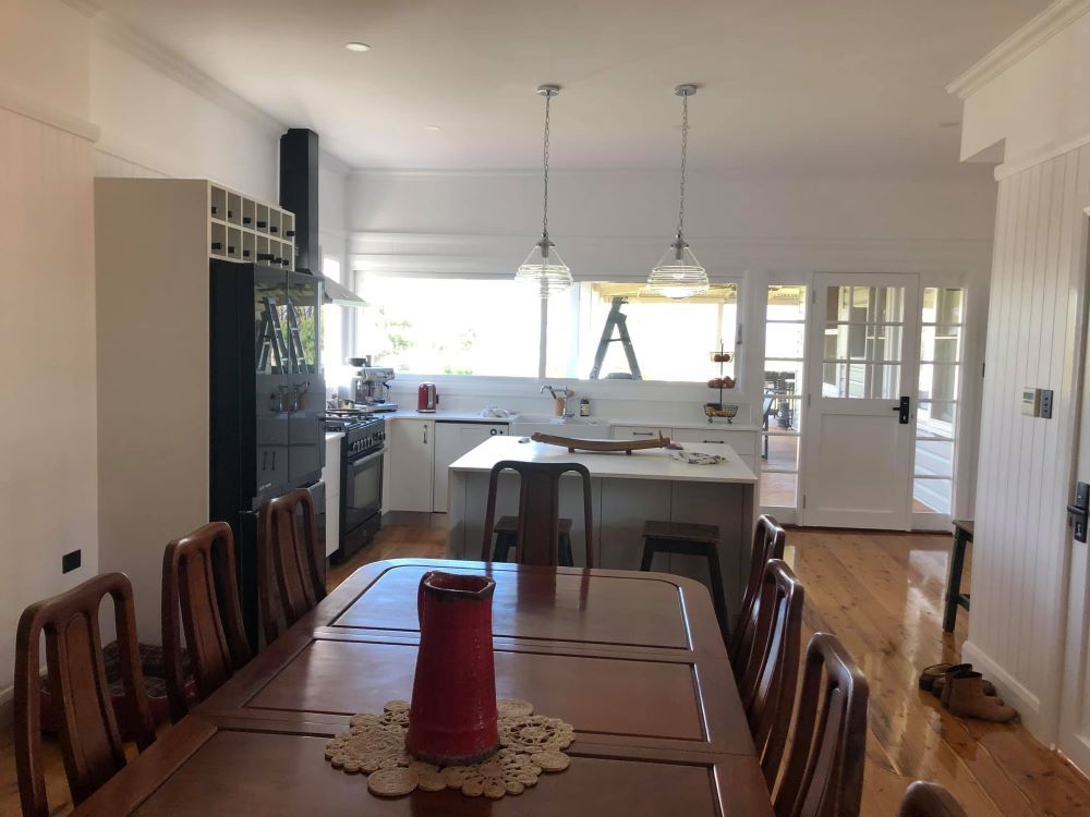 A Kitchen With a Table and Chairs in It — 4Shaw Kitchens in Bourke, NSW