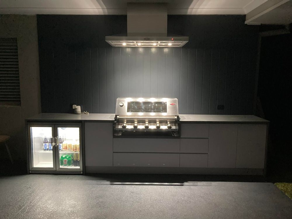 A Kitchen with a Stainless Steel Grill and a Fridge — 4Shaw Kitchens in Dubbo, NSW