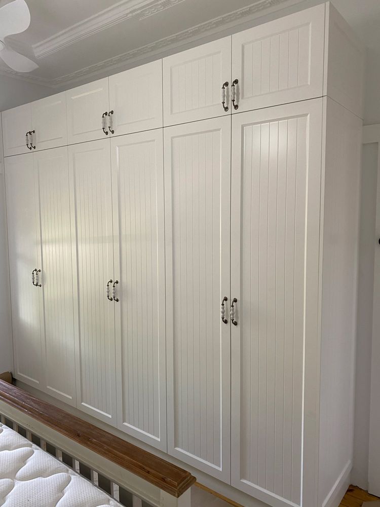 White Cabinets Wall Mounted and a Mattress on the bed — 4Shaw Kitchens in Dubbo, NSW