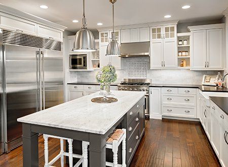Home Repair — Beautiful Kitchen In Luxury Home With Island And Stainless Steel In Asheville, NC