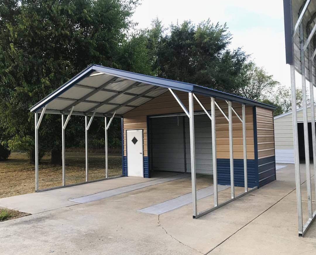a carport with a blue roof and a white door .