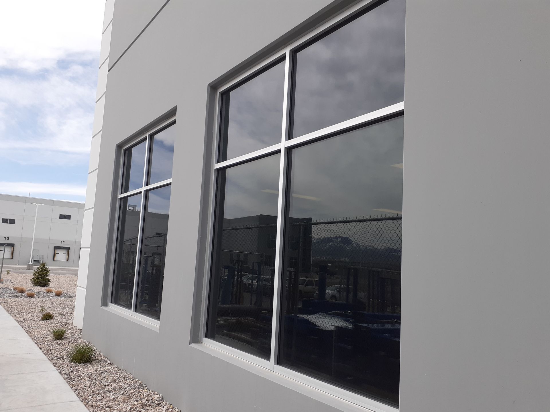 A blurry picture of a building with a lot of windows.