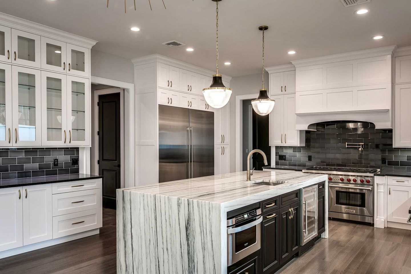 New black and white kitchen with marble island