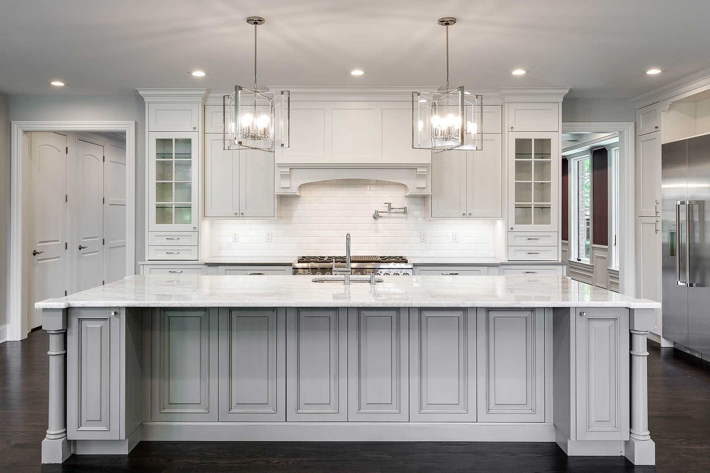 All white kitchen with pendant lighting