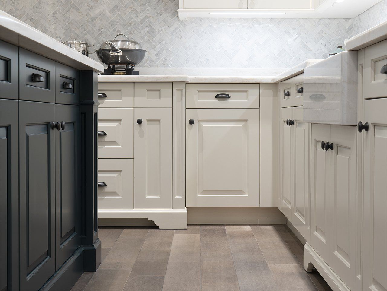 Closeup of white kitchen cabinets