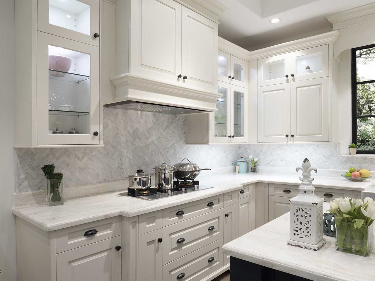 White kitchen with patterned backsplash