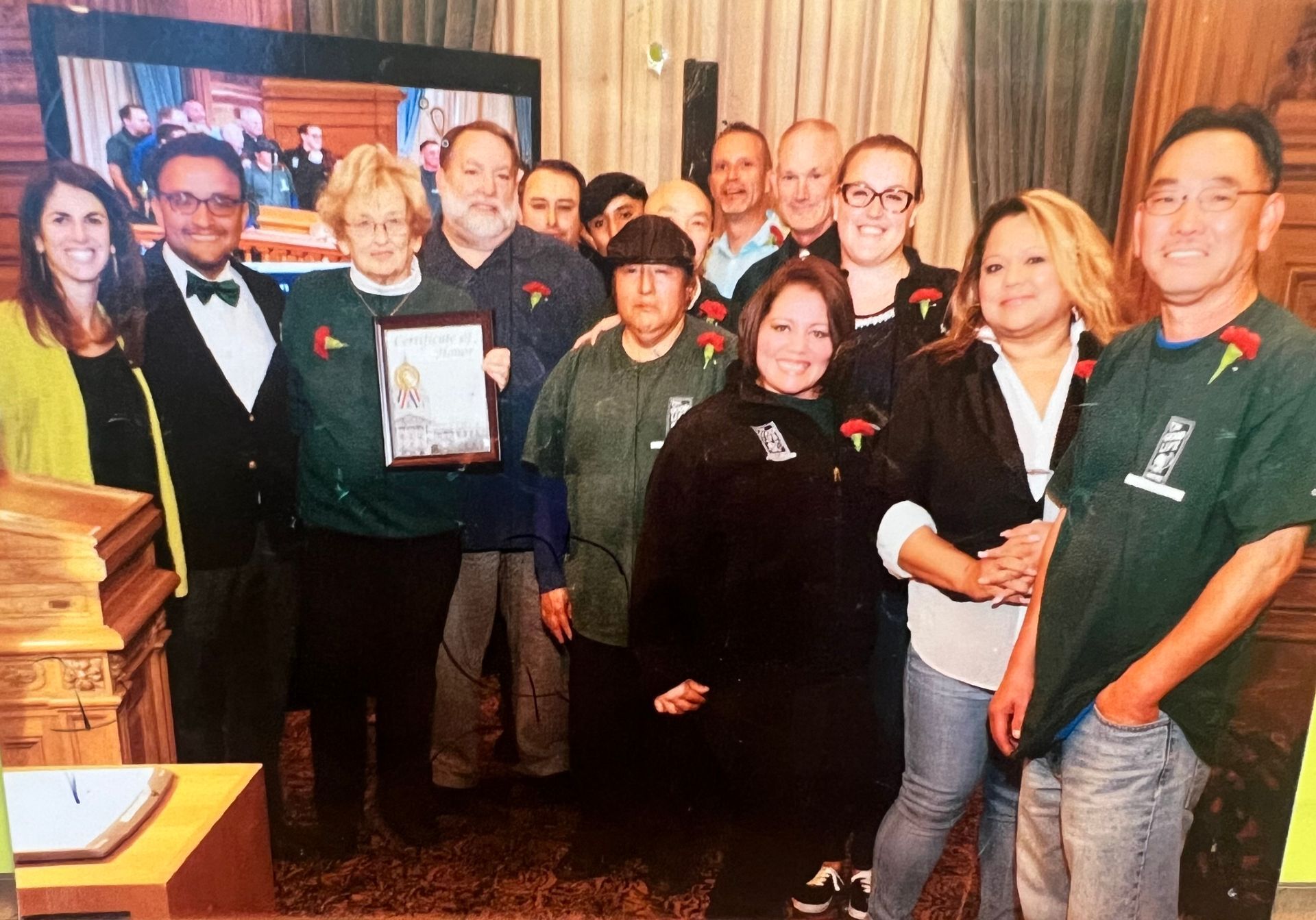 The Good Lie grocery Employees receiving an award