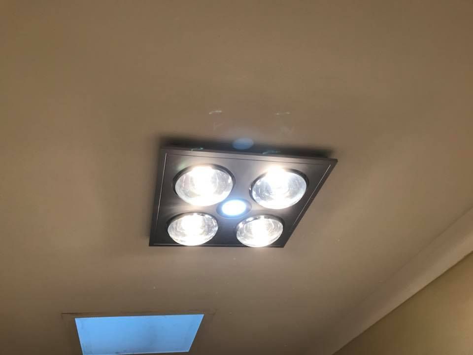 Ceiling With a Square Four-bulb Light Fixture — Quik Fire Electrical in Kelmscott, WA