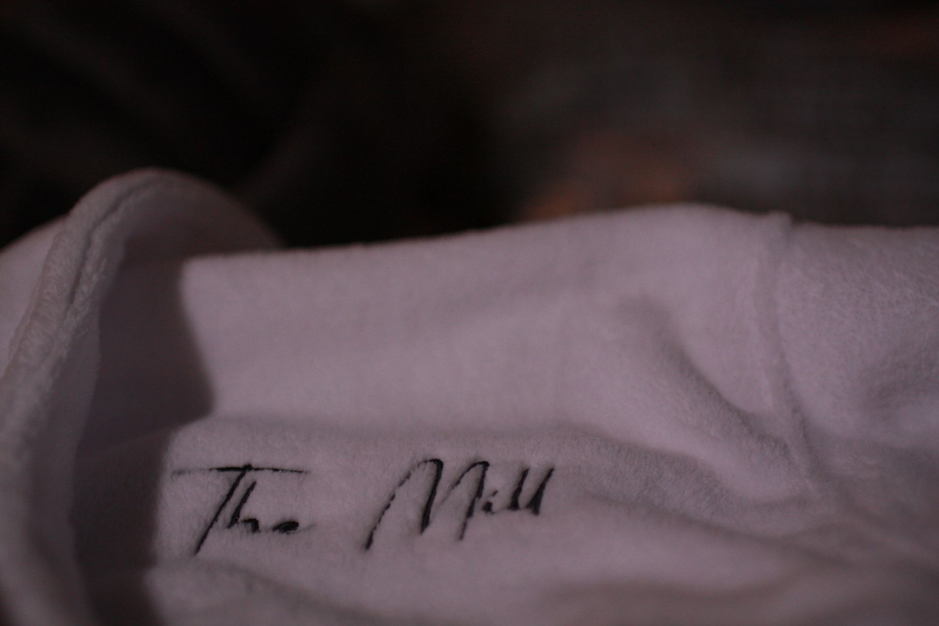 White fabric collar with the words 