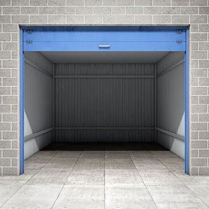 Empty Open Door Garage — Secure Storage Facility in Greeley, CO Empty Open Door Garage — Secure Storage Facility in Greeley, CO