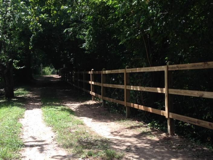 farm fence on farm trail