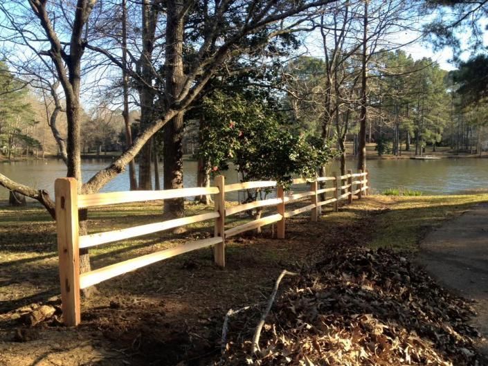 farm fence by the lake