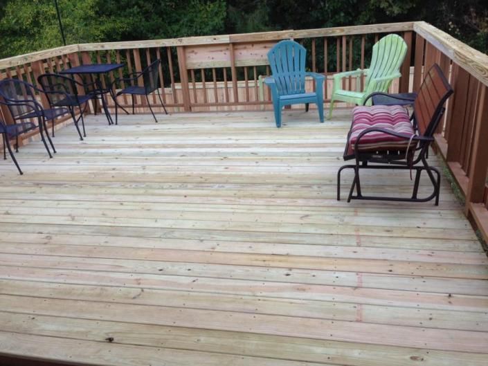 completed deck with multi colored chairs
