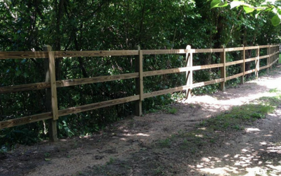 farm fence on a farm trail road