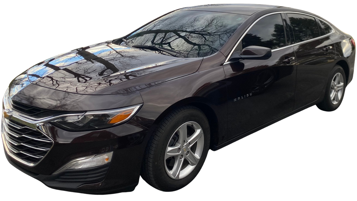 Dark brown Chevrolet Malibu sedan on a bright day.
