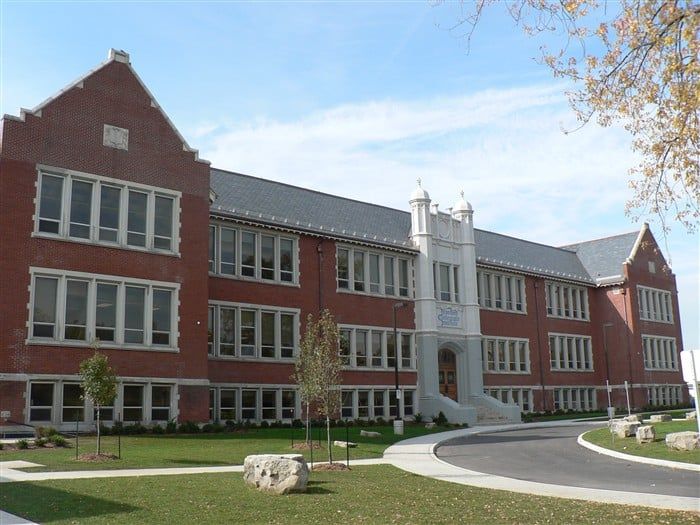 A large brick building with a lot of windows