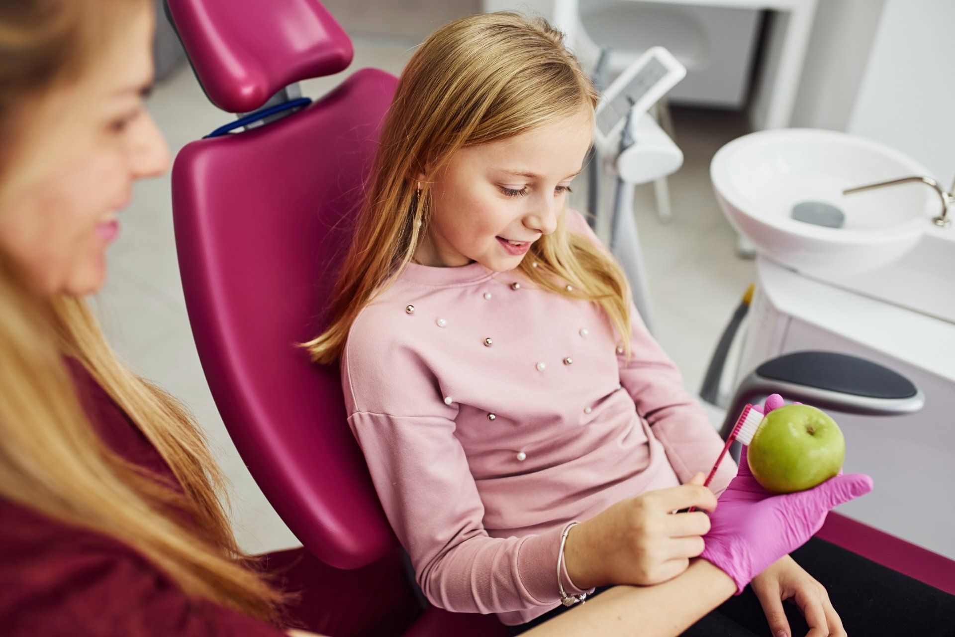 child in dentist chair