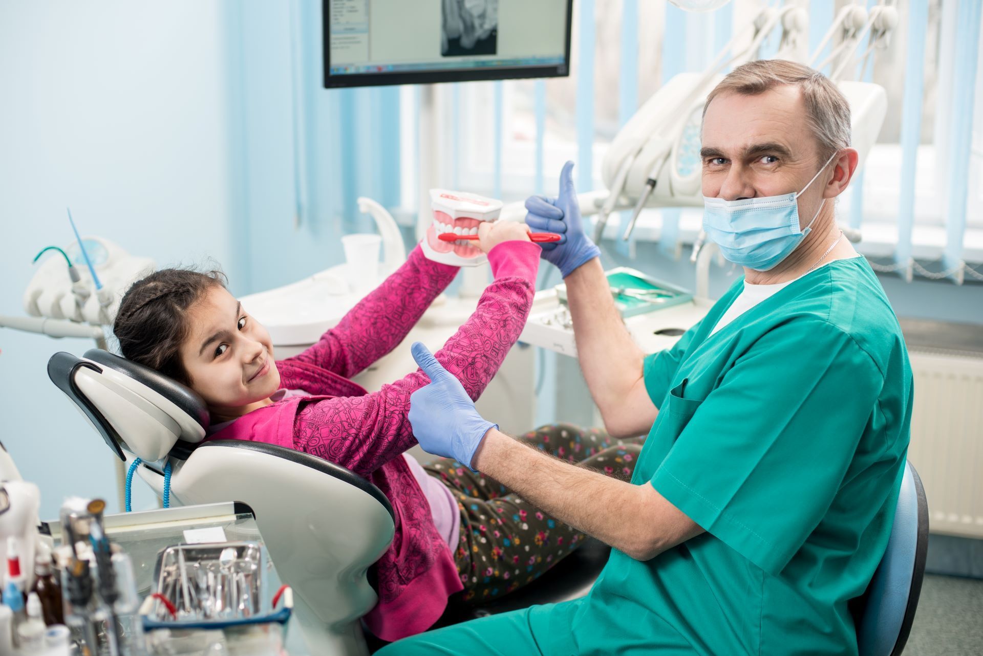 what does a pediatric dentist do