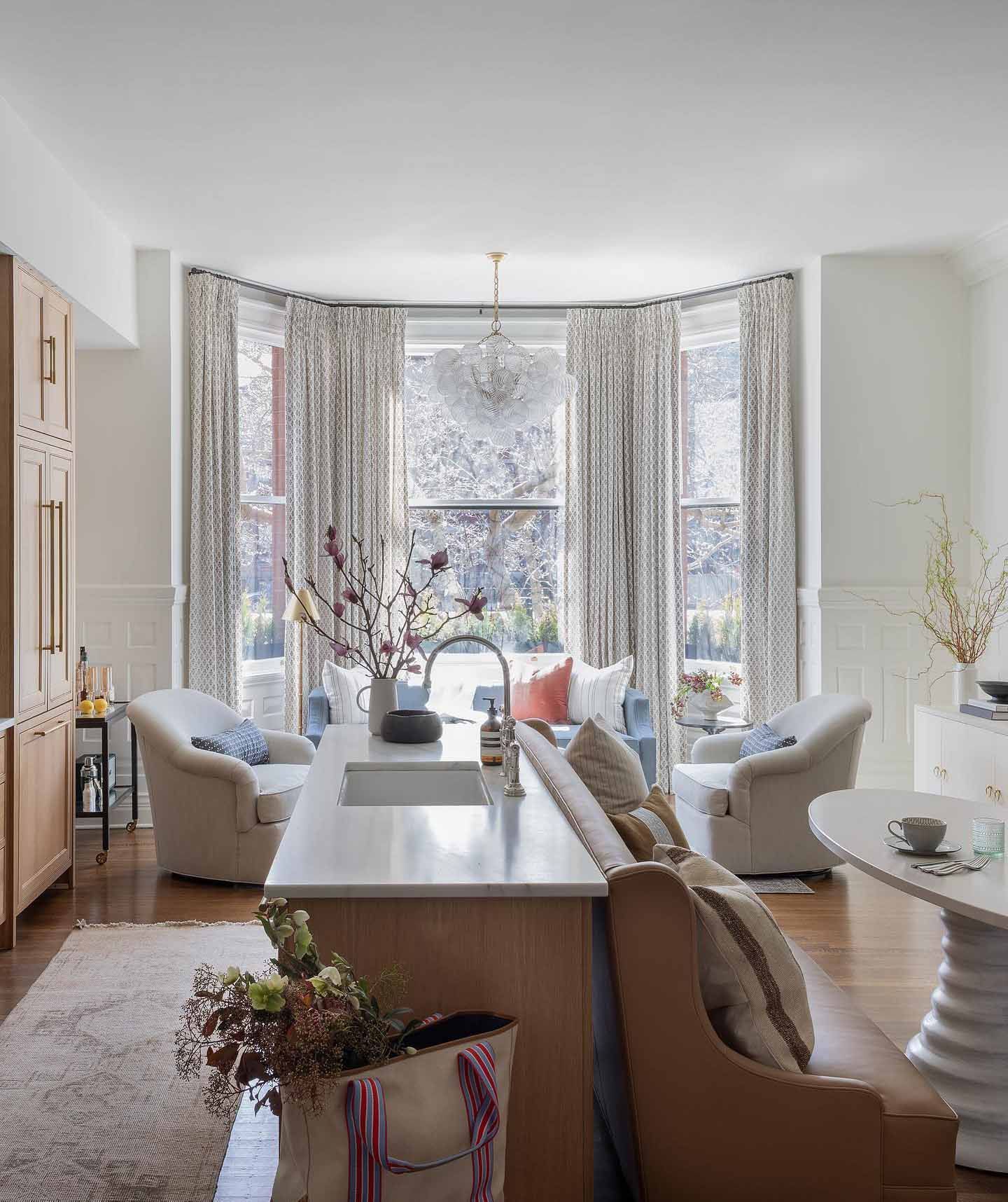 A living room with a large island in the middle