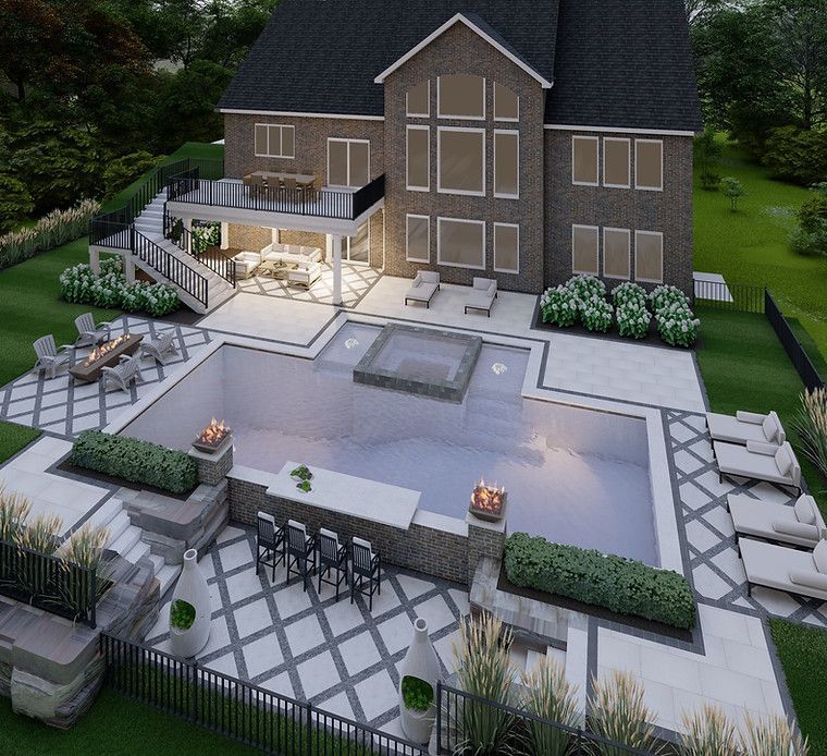 An aerial view of a large house with a large swimming pool