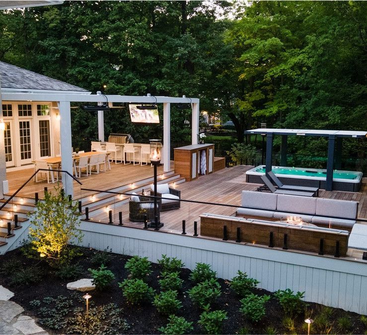 An aerial view of a patio area with a hot tub