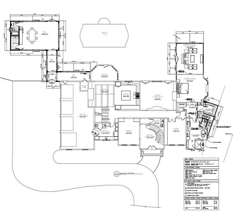 A black and white floor plan of a large house
