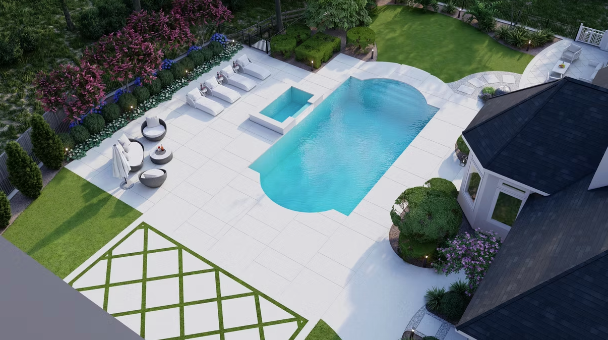 An aerial view of a large swimming pool in the backyard of a house.