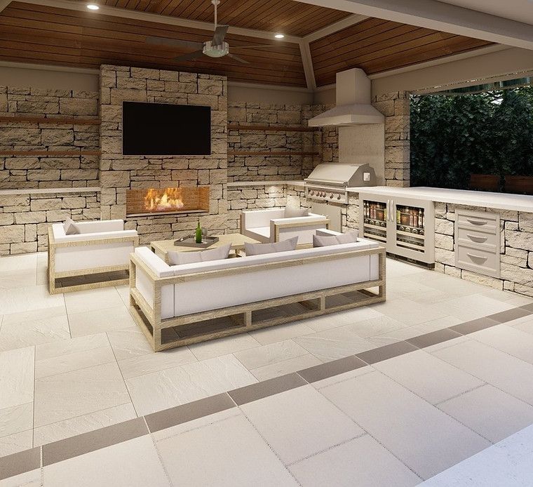 A living room with a couch and chairs and a fireplace