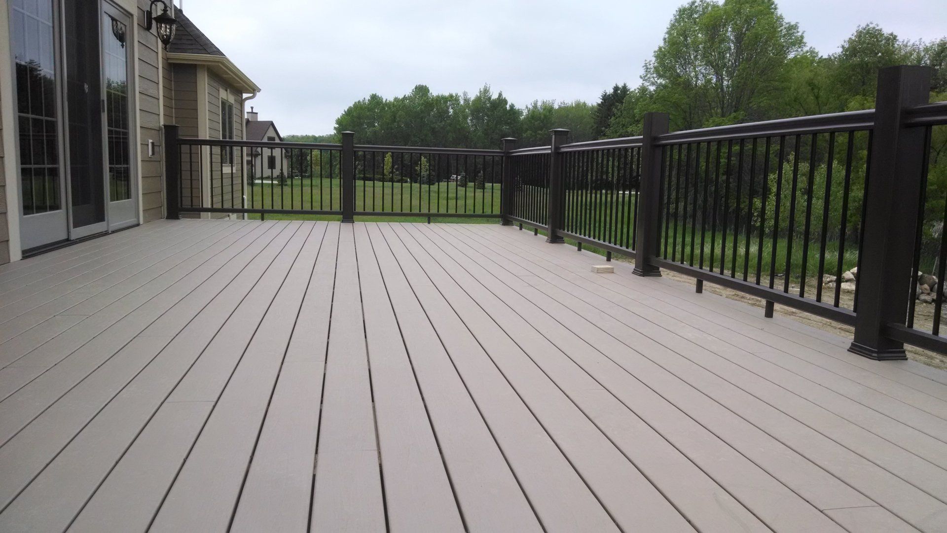 A house with a lot of windows is being built.