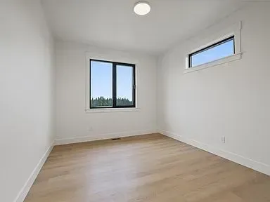 There is a large window in the middle of the room.