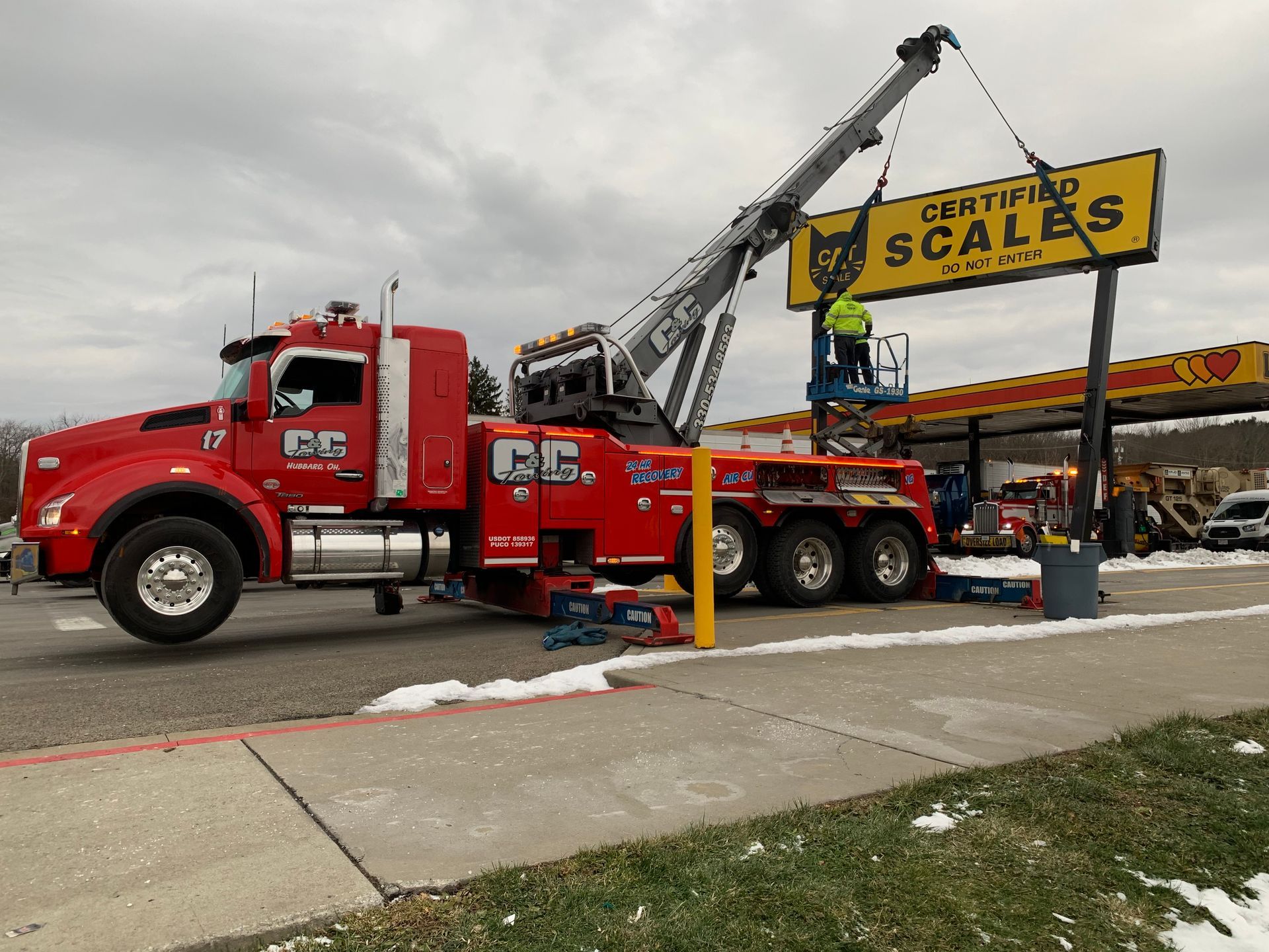 big car machinery being towed