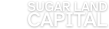 Sugar Land Capital logo in white with a shadow.