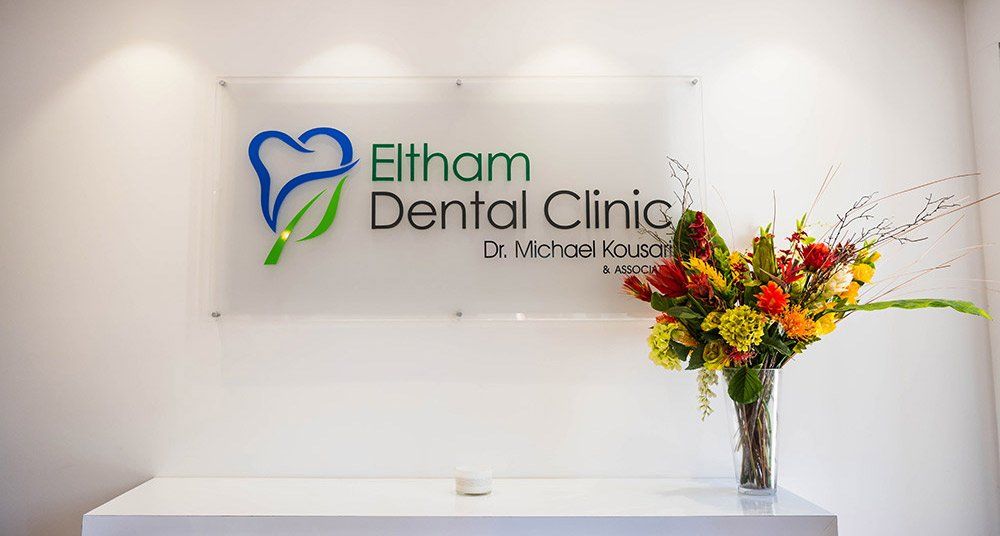 eltham dental clinic business sign and flowers