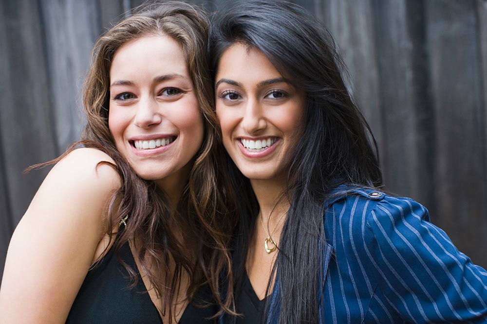 two friends smiling