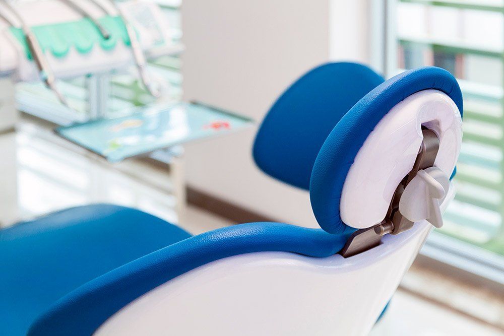 back of blue and white dental chair