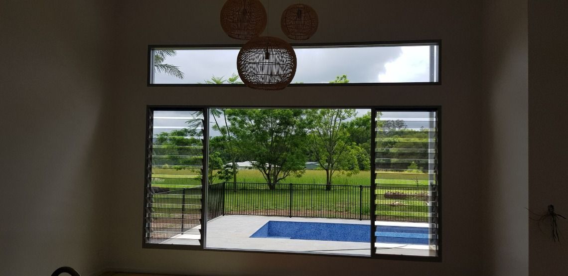 A Window With a View of a Pool and Trees — Luffys Glass in South Murwillumbah, NSW