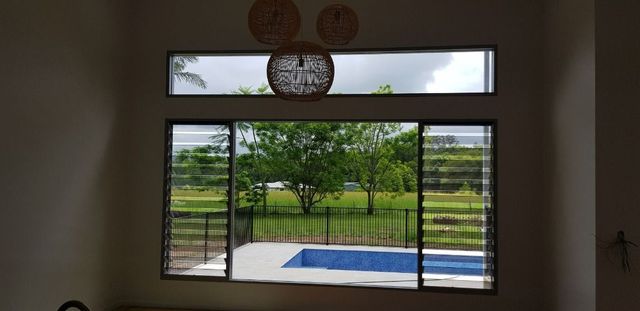 A Window With a View of a Pool and Trees — Luffys Glass in South Murwillumbah, NSW