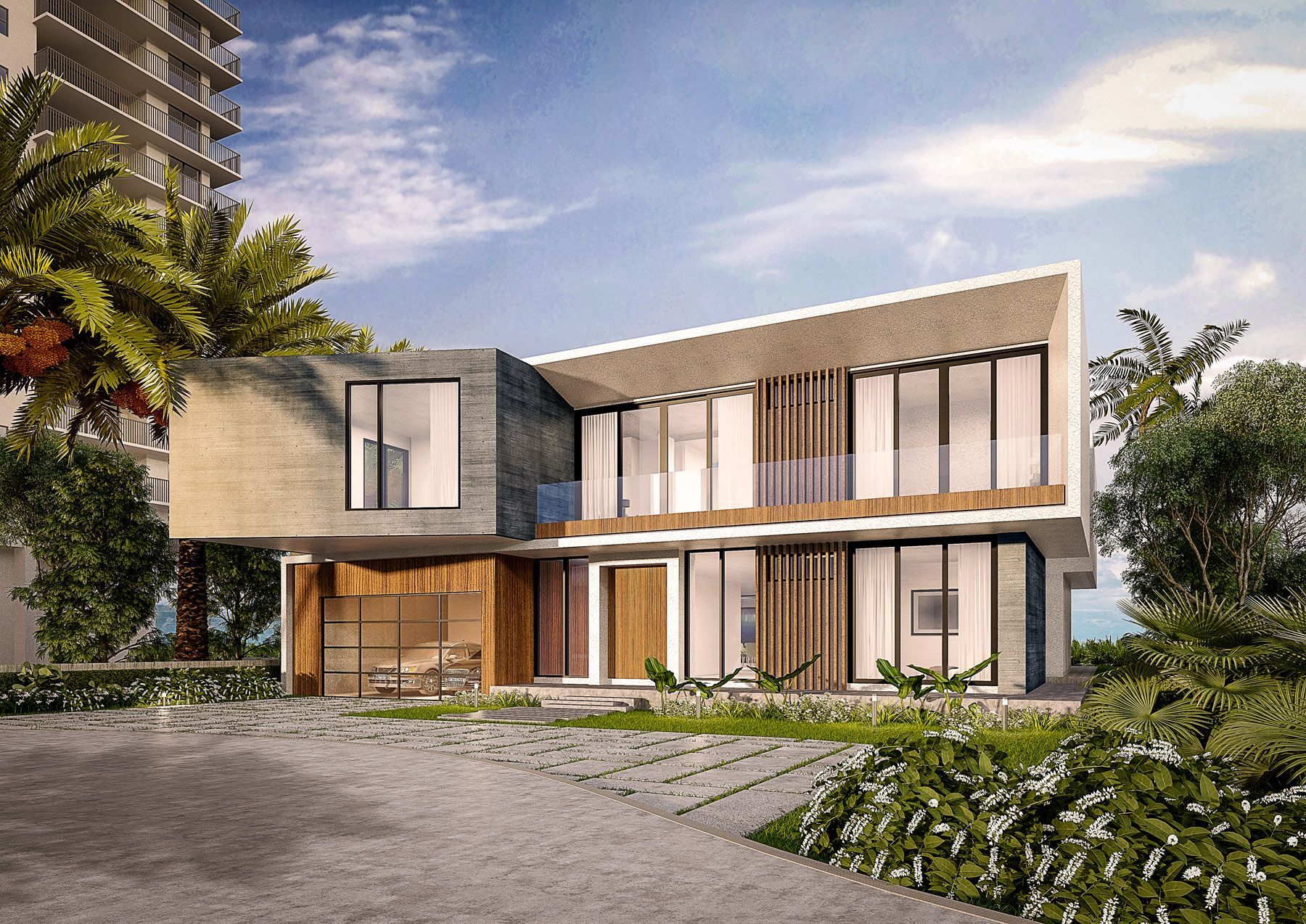 A large house with a lot of windows is surrounded by trees and bushes.