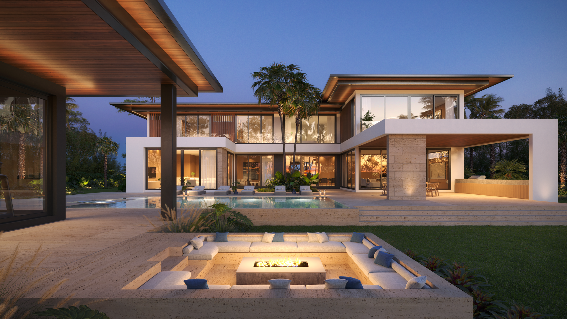 A large house with a fire pit in front of it