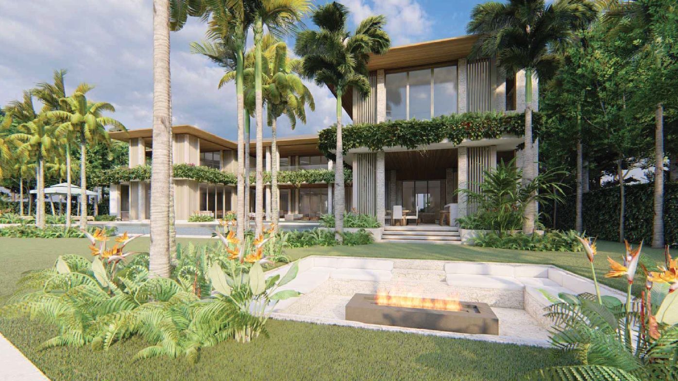 Luxury home with a fire pit, green lawn, palm trees, and outdoor seating.