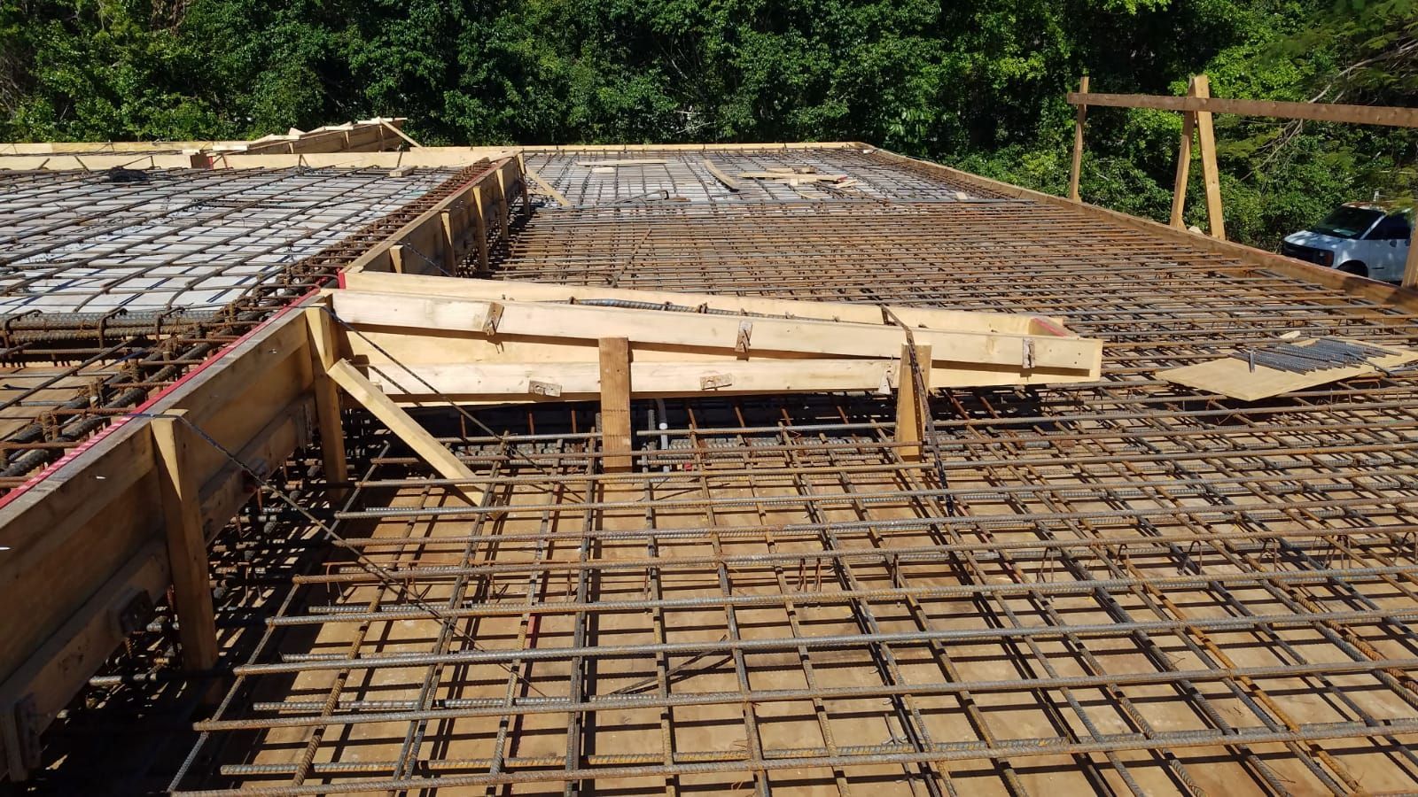 A construction site with a lot of wire and wood