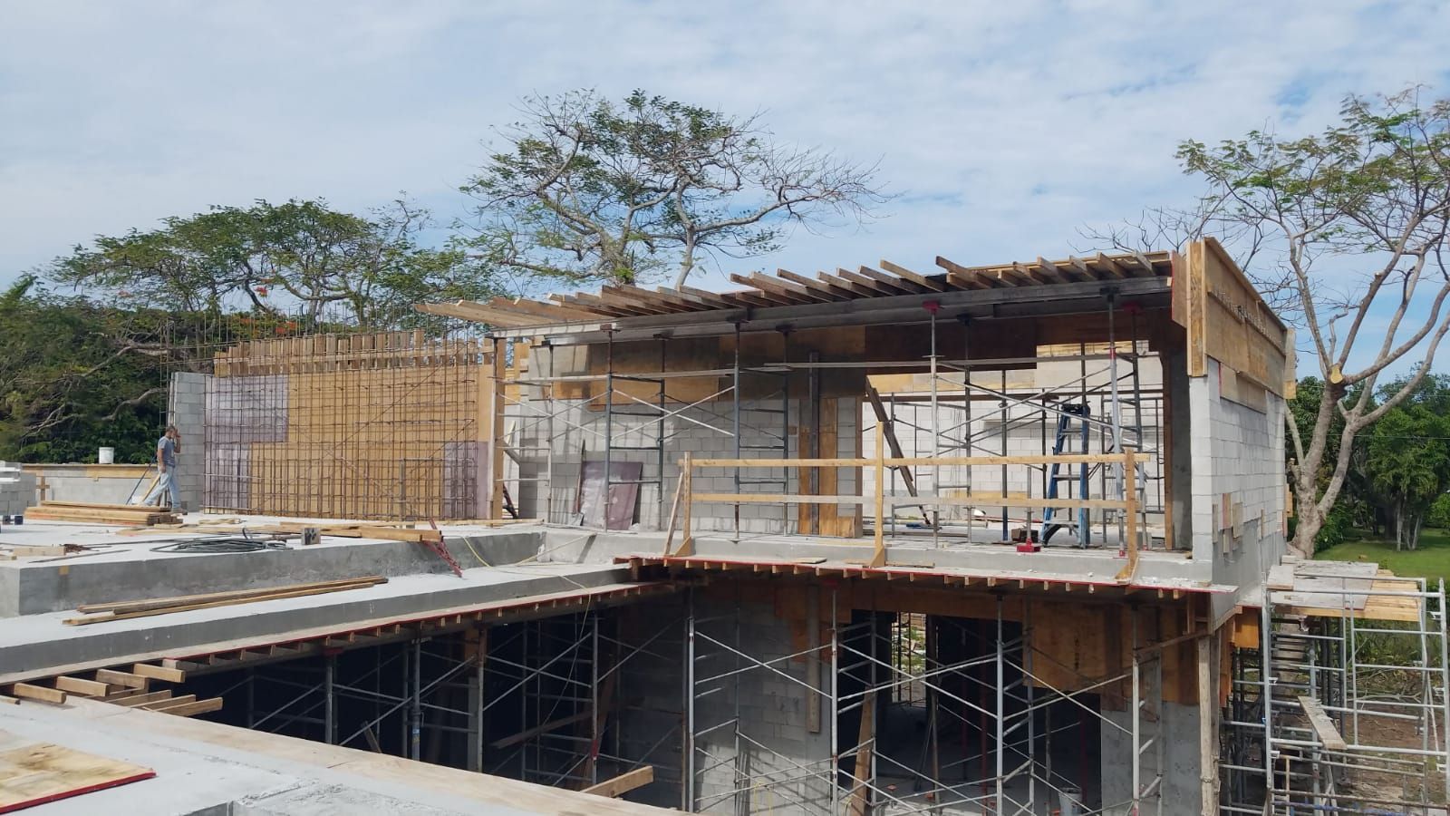 A building under construction with a lot of scaffolding around it