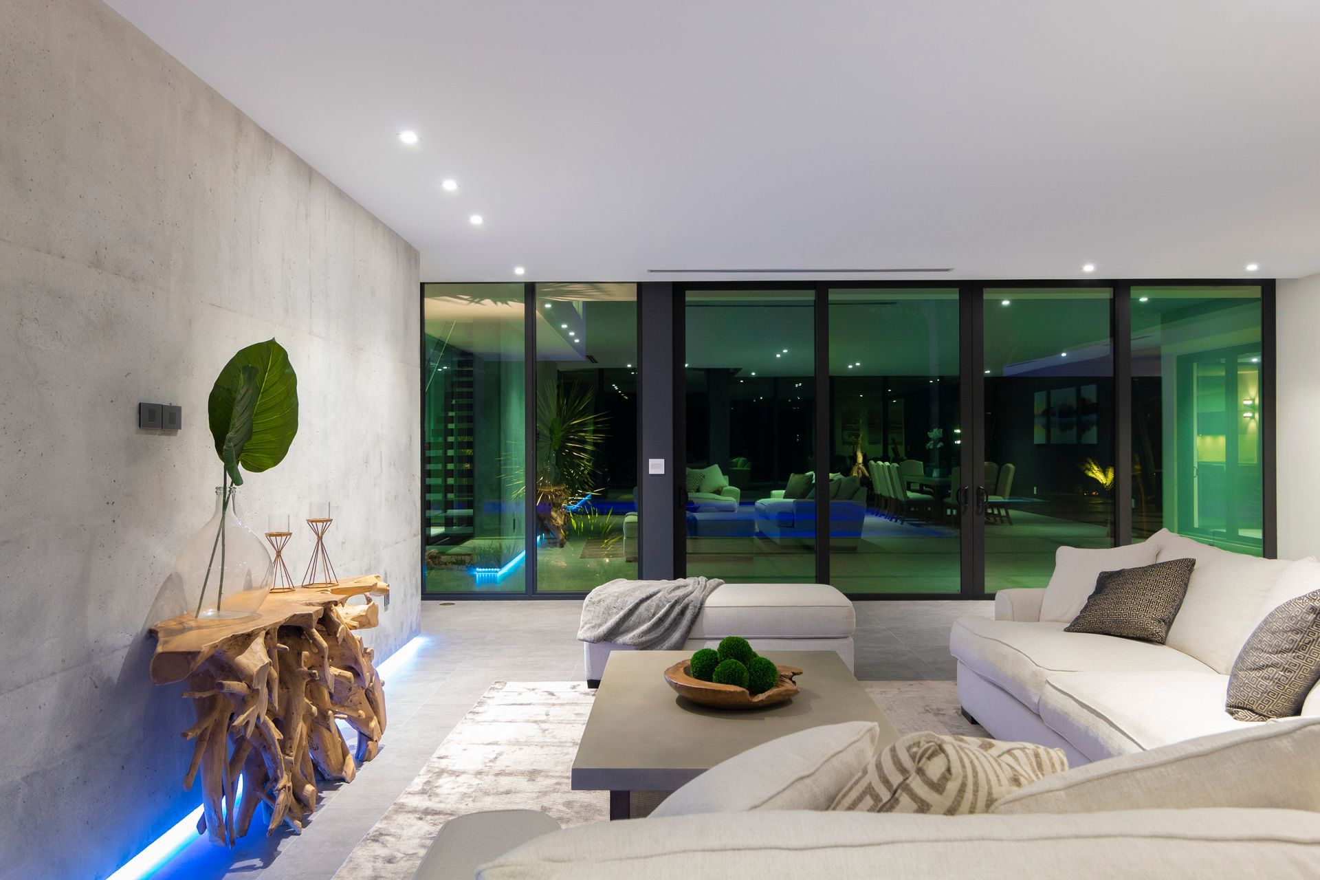 A living room with a couch and a table