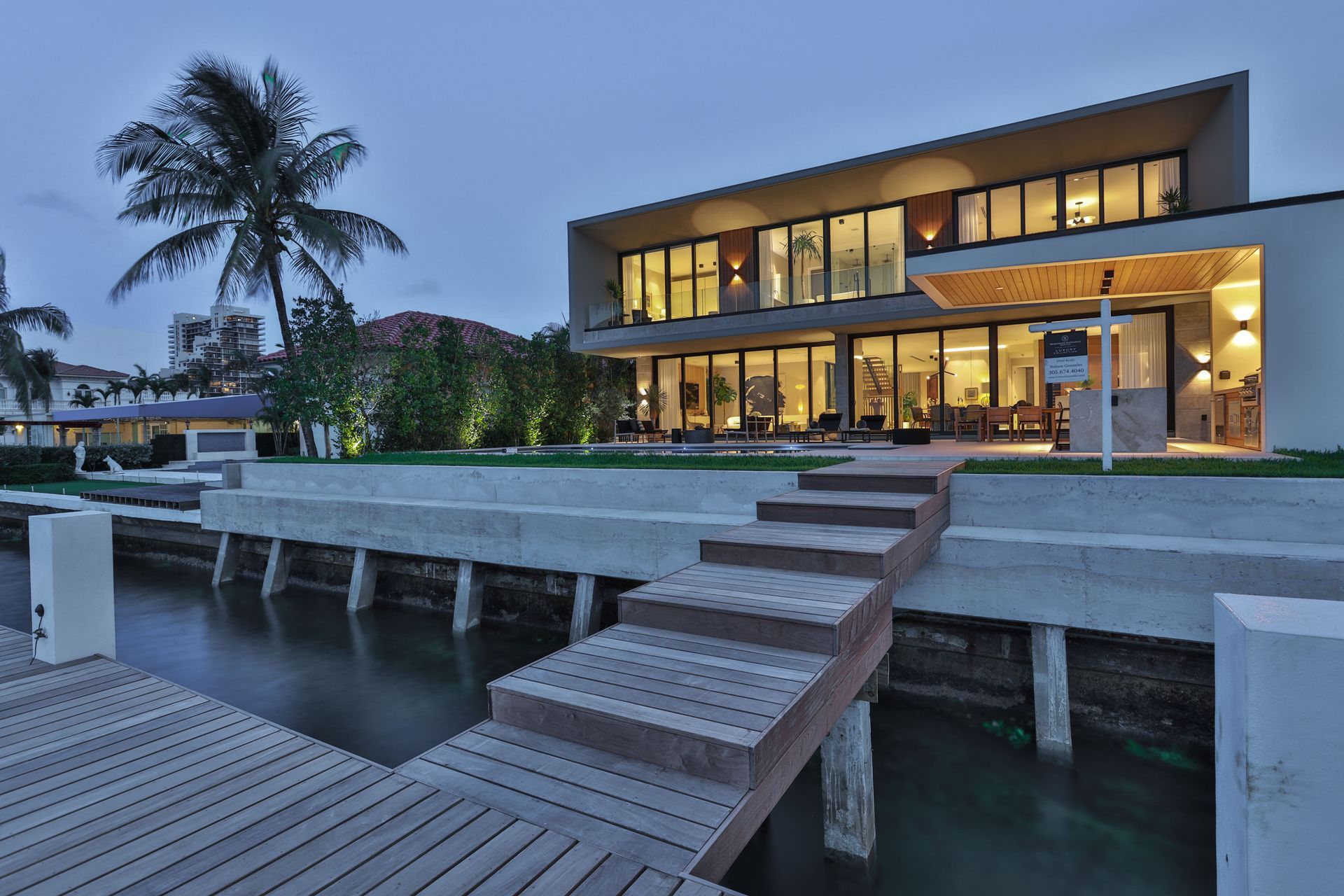 A large house with a dock in front of it