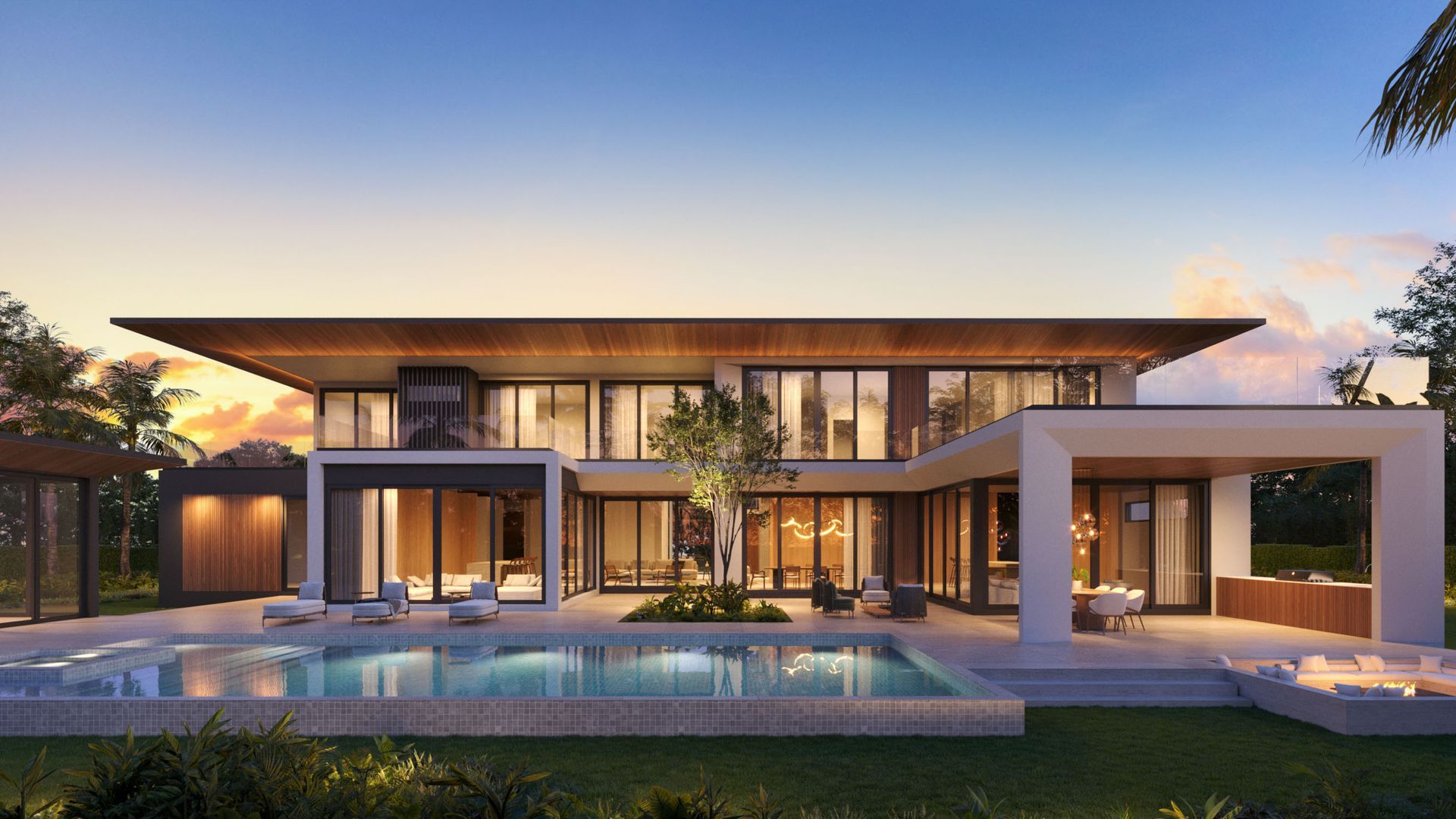 Modern two-story house with pool at sunset. Features large windows, a flat roof, and outdoor dining area.