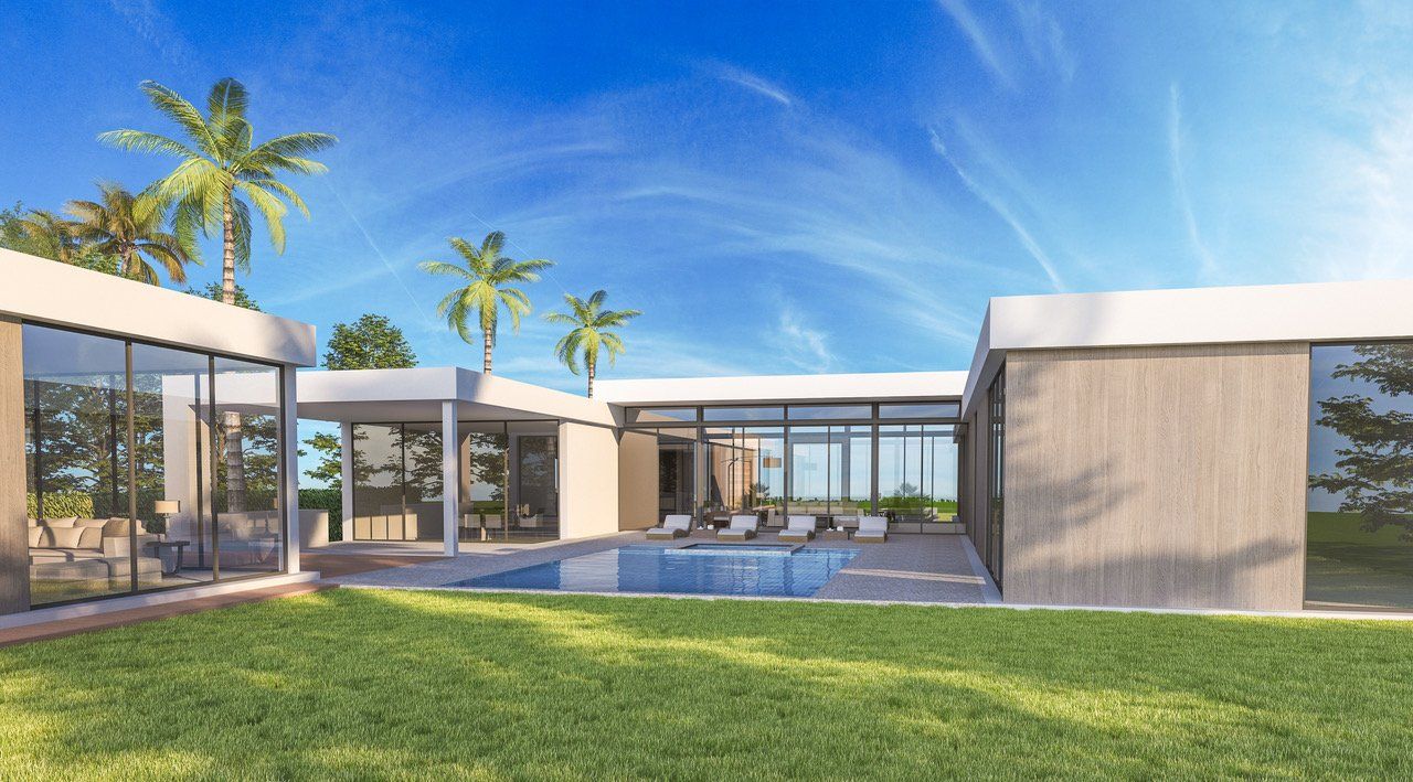 Modern house with pool, palm trees, and glass walls under a blue sky.