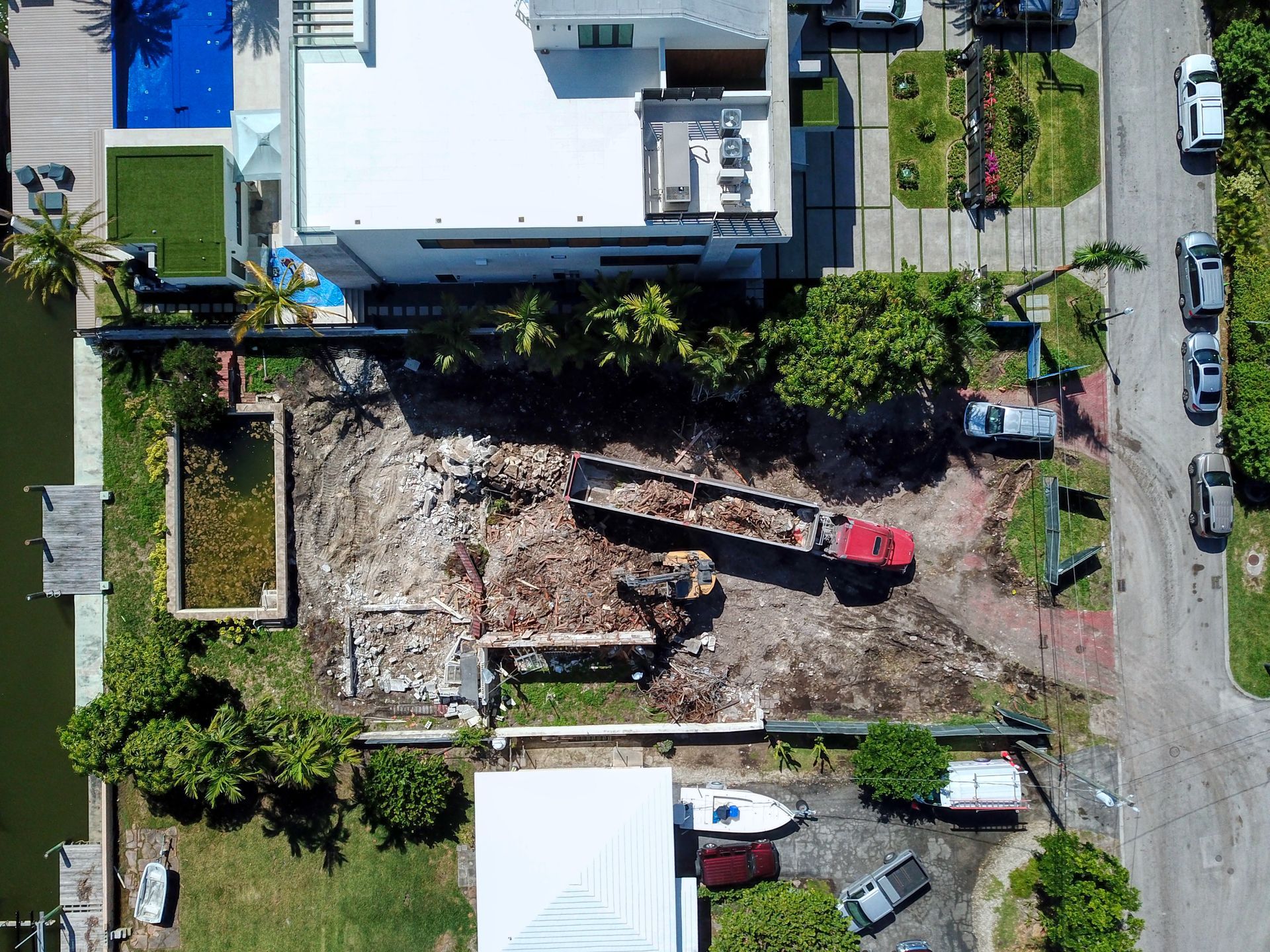 An aerial view of a house with a swimming pool