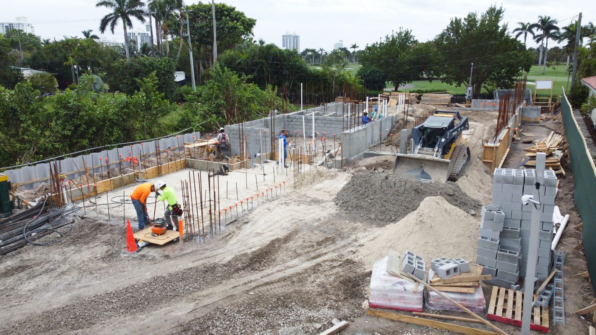 A group of construction workers are working on a construction site