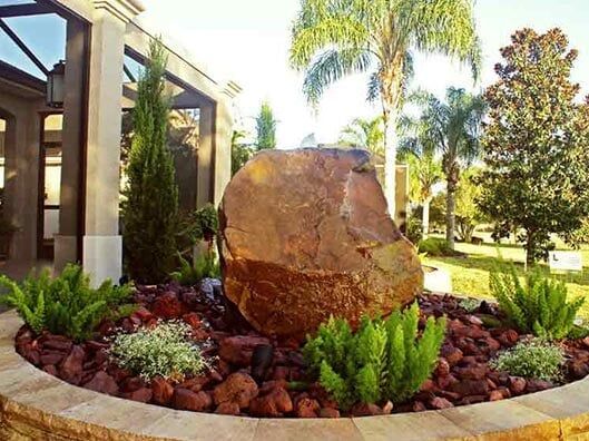 Landscaped Design With Big Rock - Luke's Landscaping in Florida
